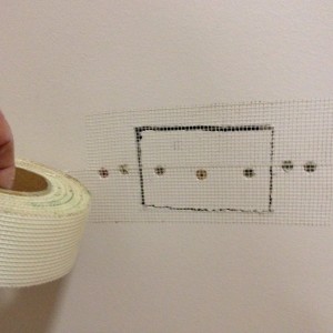 How to repair a plaster wall hole