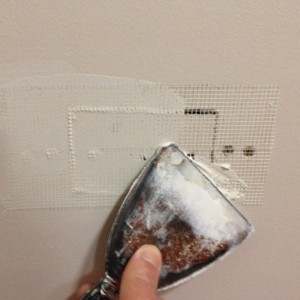 How to repair a plaster wall hole