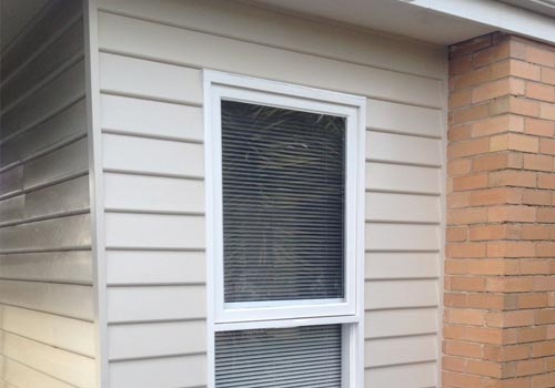 Painting Weatherboards and Window in Melbourne Yarraville